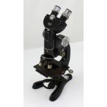 A Beck of London model 48 microscope numbered 20478, height approx 37cm.