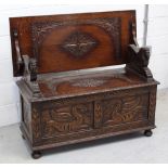 An early-to-mid 20th century oak monks' bench or box settle,