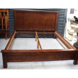 A contemporary oak king-size bedstead, width 201cm.