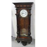 A late 19th/early 20th century mahogany Vienna-style wall clock,