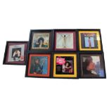 A collection of framed and cased Shirley Bassey albums to include three signed examples,