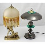 An Art Deco style table lamp in the form of a naked female and one other (2).