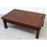 A modern hardwood coffee table, length 122cm.