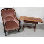 A Victorian tub chair, carved frame with shell motif to back,