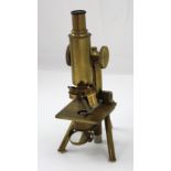 A J Swift & Son of London brass microscope numbered 16539, height approx 31cm.