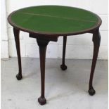 A reproduction mahogany demi-lune fold-over card table, diameter 80cm.