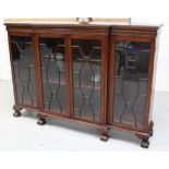 A reproduction mahogany break-front display cabinet with two shelves, width 184cm.