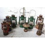 Eight vintage hurricane lamps to include green painted examples (8).
