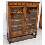 An early-to-mid 20th century oak bookcase,