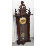 A late 19th/early 20th century mahogany Vienna-style wall clock,