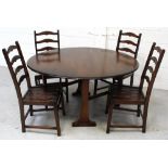 An Ercol oak 'Old Colonial' drop-leaf dining table,