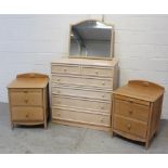 A pair of contemporary washed oak bedside cabinets,