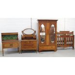 An Edwardian mahogany four-piece bedroom suite, with chevron line inlay, comprising dressing chest,
