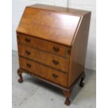 A reproduction walnut bureau, width 75cm.