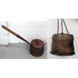 A copper pot converted into a lamp shade, height 33cm and a further wooden-handled copper pot (2).