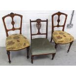 A pair of Edwardian walnut dining chairs with boxwood line inlay and marquetry medallions,