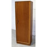 A contemporary teak single-door wardrobe cabinet on plinth base, 176 x 61cm.