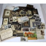 A collection of mainly early 19th century and later vintage photographs, various stamps,