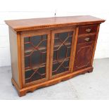 A reproduction mahogany cabinet,