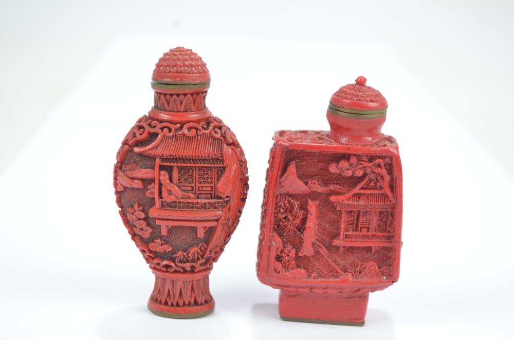 A Chinese cinnabar snuff bottle of flat ovoid form,