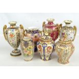 A group of Noritake vases, including Egyptian decorated example and floral painted examples,