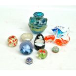 A mixed lot of glass paperweights including Caithness examples, also a Mdina vase and a small dish.