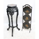 A late 19th/early 20th century Chinese ebonised carved wood pink marble inset jardinière stand of