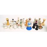 A collection of various ceramic hat pin stands including WR & S 'Porcelle',