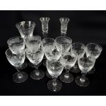 Two sets of six Royal Brierley wine glasses, a large flared example and a pair of candlesticks (15).