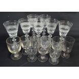 Nine clear glass rummers and seven modern wine glasses (16).