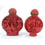 A Chinese cinnabar snuff bottle of flat circular form decorated with figural garden scenes to each