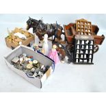 A collection of various ceramic ornaments including thimbles,