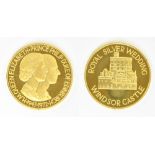 A 25th wedding anniversary of HM Queen Elizabeth II and Prince Philip 22ct gold medallion limited