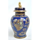 A Carlton Ware 'Kang Hsi' pattern decorated baluster vase and cover with gilt Dog of Fo finial on