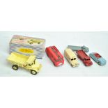 A small group of Dinky diecast model vehicles comprising boxed 965 'Euclid Rear Dump Truck',