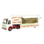 A painted wooden model 'Cottage Loaf Bakery' articulated lorry, length 64cm.