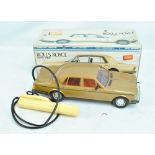 A boxed Rico Rolls Royce Silver Spirit model car with attached battery operated controller,