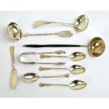 A mixed group of silver including two ladles, four coffee spoons, a small butter knife,