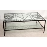 A large wrought iron framed rectangular coffee table with two glass inset tiers, 137.5 x 90cm.