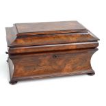 An early Victorian rosewood sarcophagus tea caddy with hinged lid (now lacking interior),