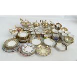 A large collection of Noritake tea and coffee ware including floral decorated cups and saucers,