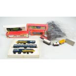 A group of boxed and loose Hornby OO gauge models including Inter-City 125 three part set (lacking