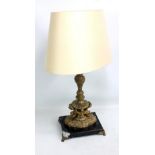 A gilt metal mounted black marble table lamp.