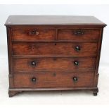 A 19th century mahogany chest of two short over three long drawers flanked by quarter columns above