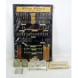 A mid to late 20th century William Mitchell's lettering pens advertising board, together with pens,