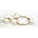 SHELLEY; a 'Lowestoft' six setting tea set comprising trios, sandwich plates, a cream jug,