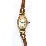 A lady's vintage 9ct yellow gold cased wristwatch with elongated octagonal case and dial,