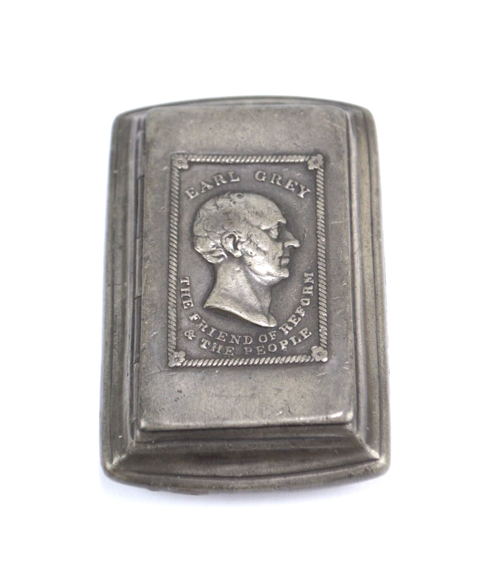 A rectangular metal snuff box with bust and motto 'Earl Grey The Friend of Reform & The People' to