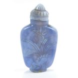 A Chinese carved pale grey agate and violet snuff bottle of flat tapering form,