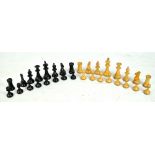 A cased wooden chess set, height of king 9.3cm (complete).